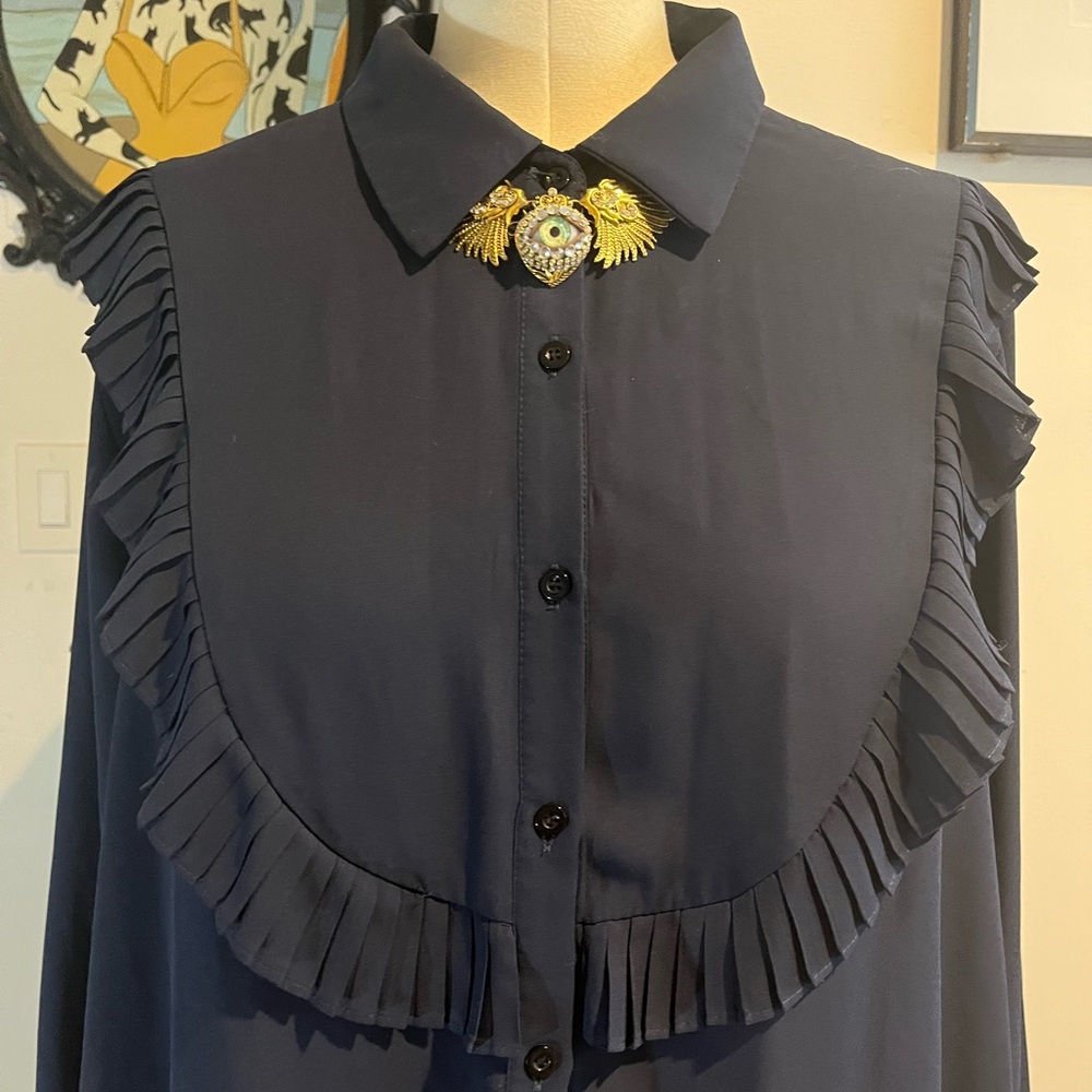 Blue ruffle bib blouse
